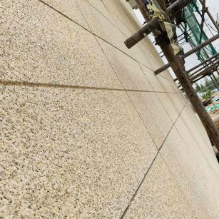 蚌埠 黄金麻花岗岩荔枝面外墙干挂石材效果示例